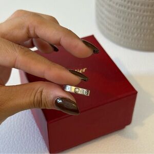 Cartier Silver Ring with Diamond Accents
